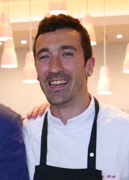 Eneko Atxa in his chef's jacket and apron
