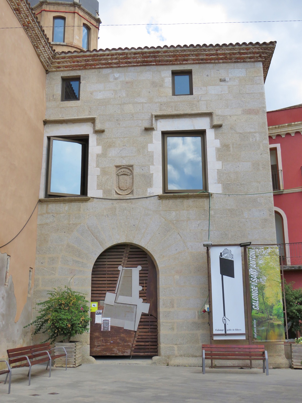 Stone facade of Calonge castle in the town's Plaça Major