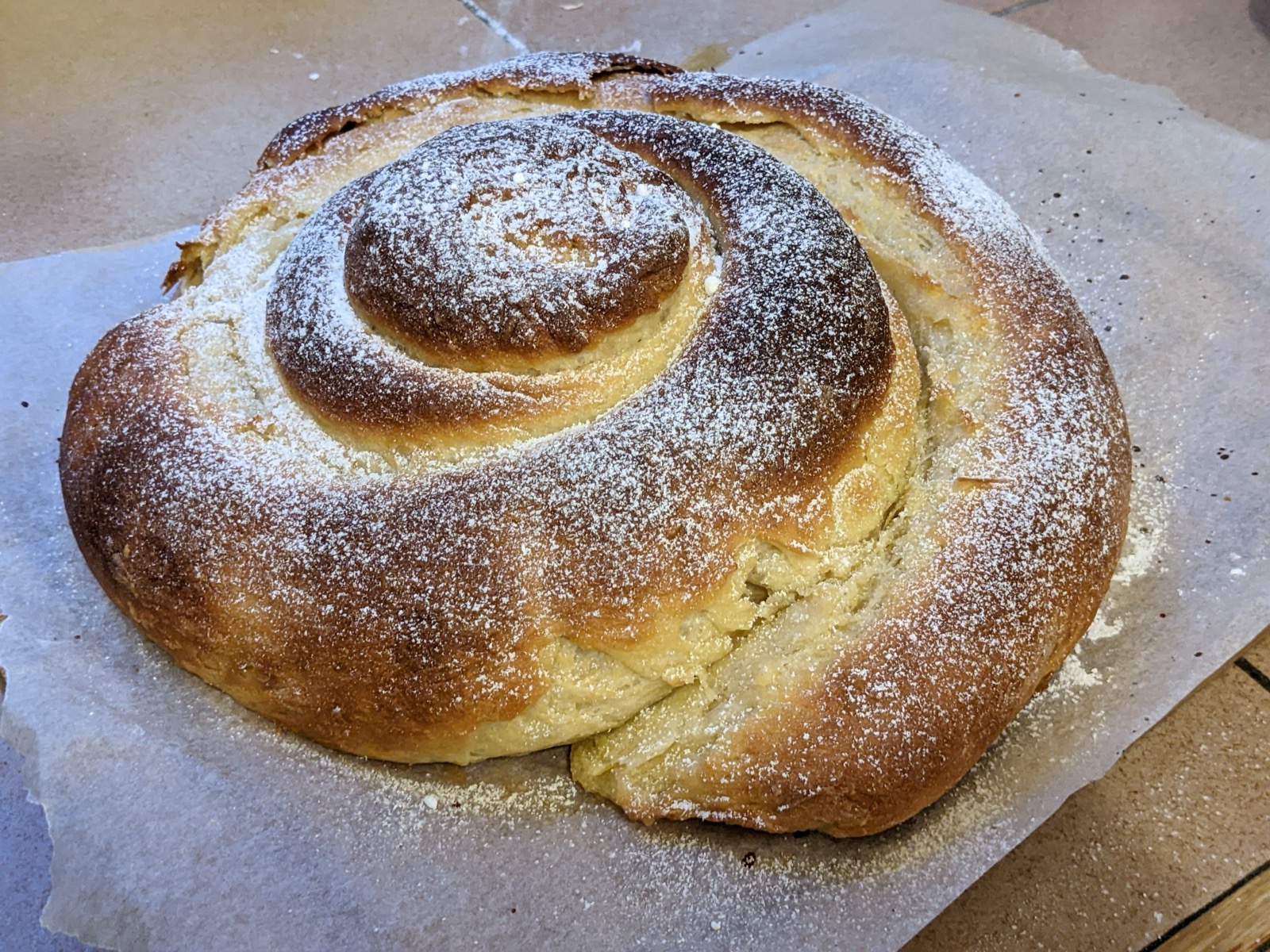 A traditional Mallorcan ensaïmada pastry dusted with icing sugar