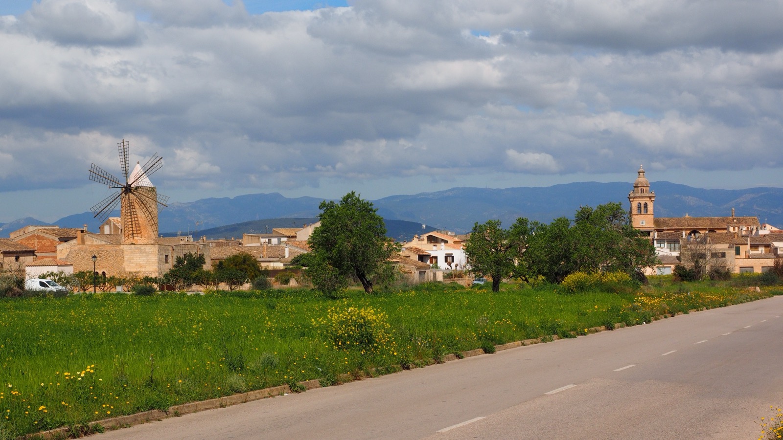 The town of Algaida with its traditional windmill and church tower