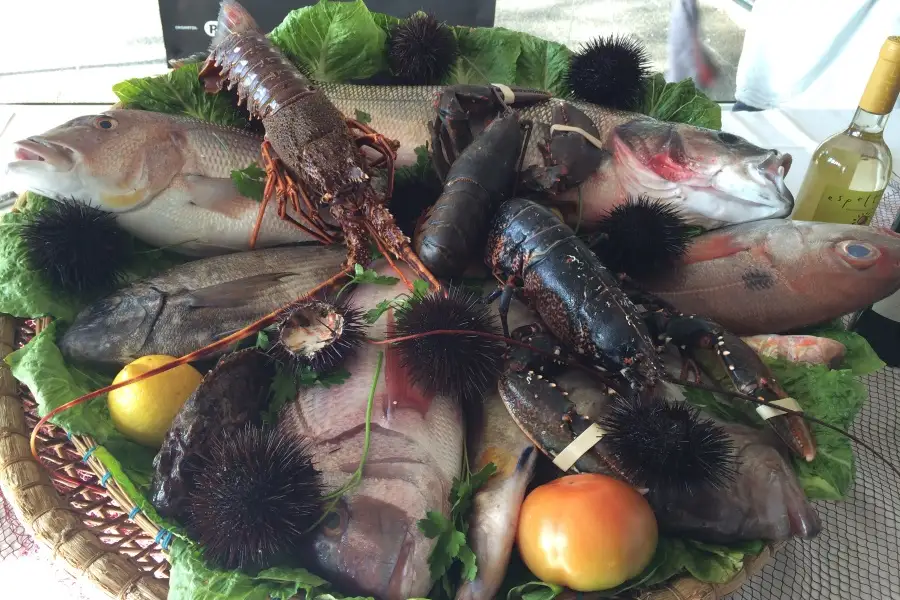 A platter of sea urchins, lobster and fish served for La Garoinada