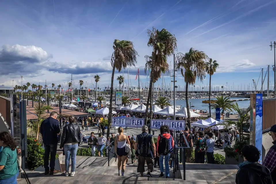 Crowds heading down to the Port Flea market stalls by the harbour