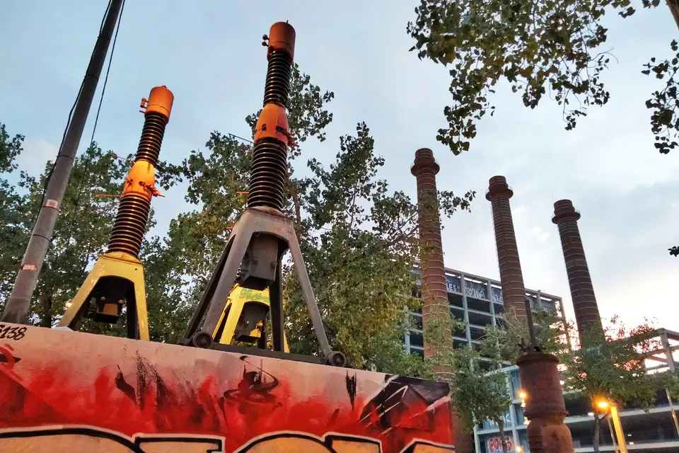 Industrial sculptures and the three chimneys in the Parc de les Tres Xemeneies, Poble-sec