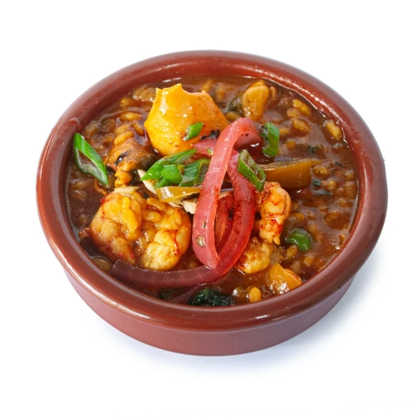 Prawn and rice tapa in a clay cazuela served on the Tapantoni Sant Antoni tapas route