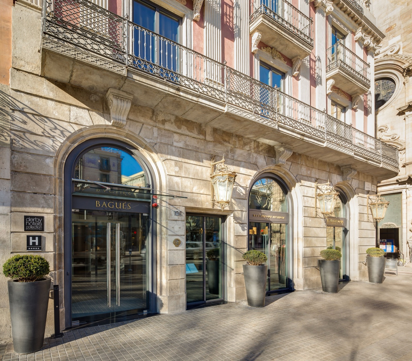 Hotel Bagués ornate stone facade and entrance on Rambla dels Estudis