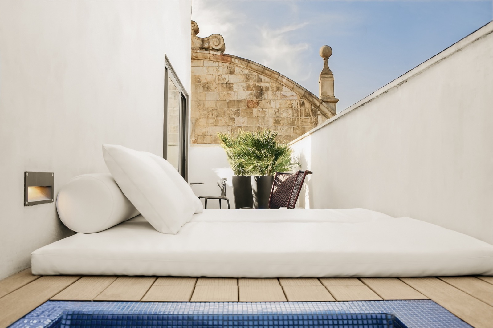 Jewel Suite private rooftop terrace with a plunge pool and daybed