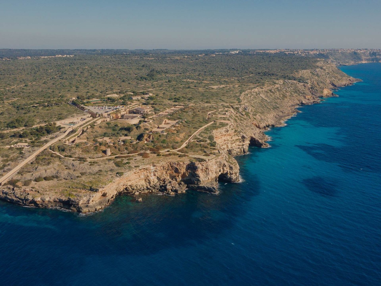 Aerial view of the Cap Rocat fortress hotel on the cliffs above the Mediterranean