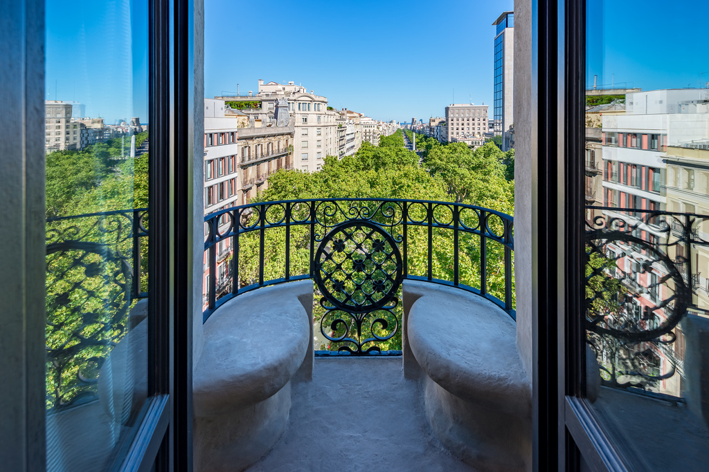 Modernist wrought-iron balcony overlooking Passeig de Gràcia