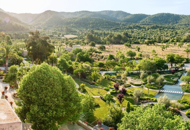 Aerial view of the Castell Son Claret estate grounds and Tramuntana foothills