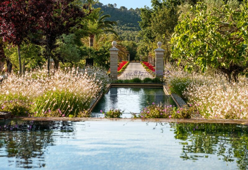 Formal garden with reflection pool at Castell Son Claret