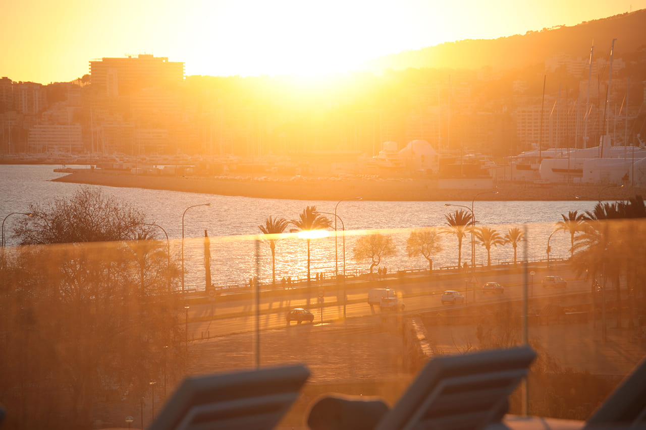 Sunset view of the Bay of Palma from the Es Princep rooftop terrace loungers