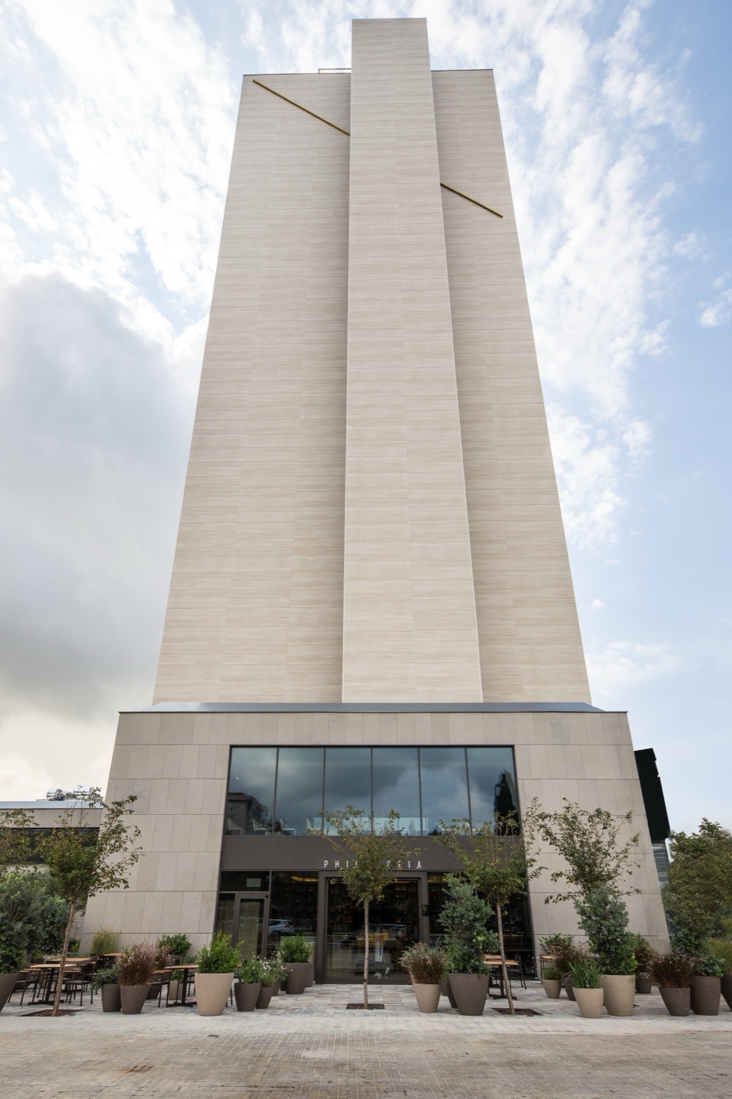 Exterior of the hotel's tower facade from street level