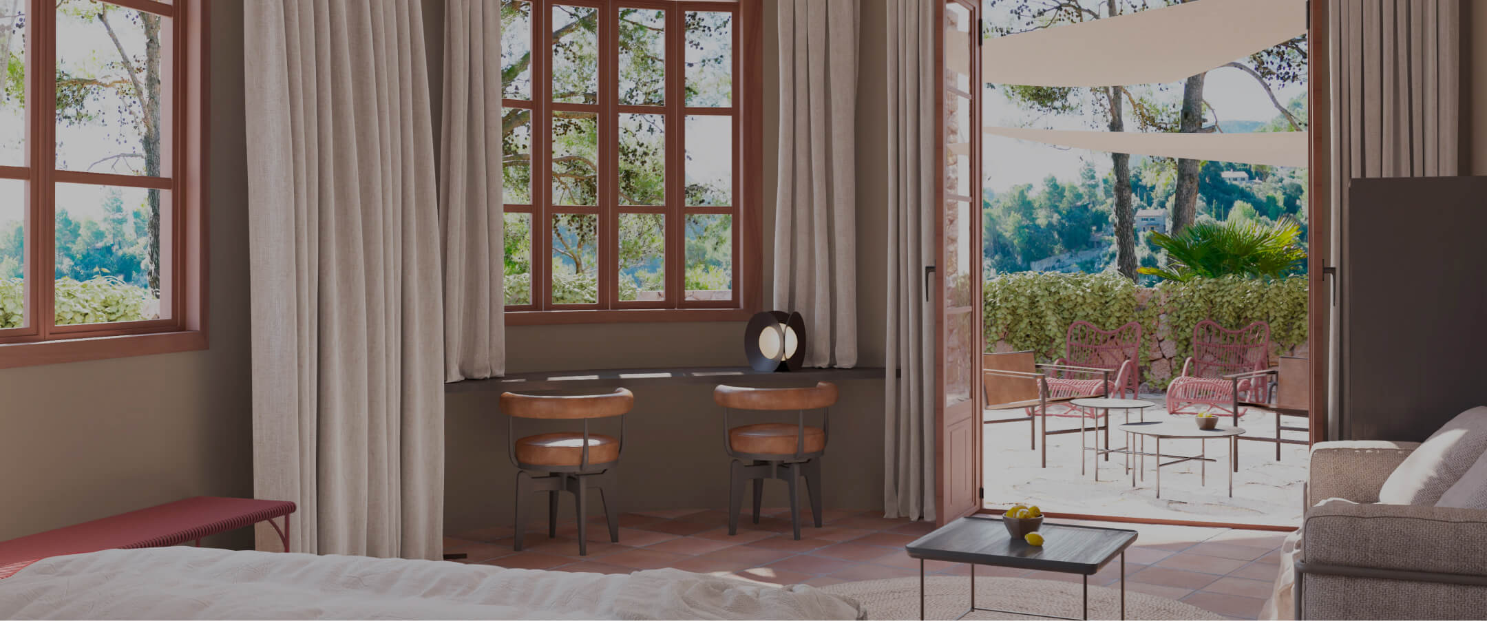 Guest room with a curtained window nook and doors open to a furnished terrace among trees