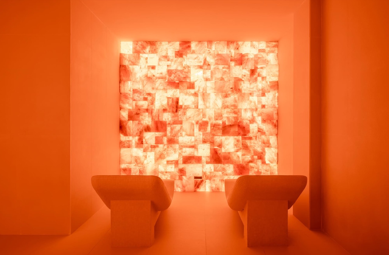 Spa by CODAGE relaxation room at Kimpton Aysla Mallorca with an illuminated salt stone wall