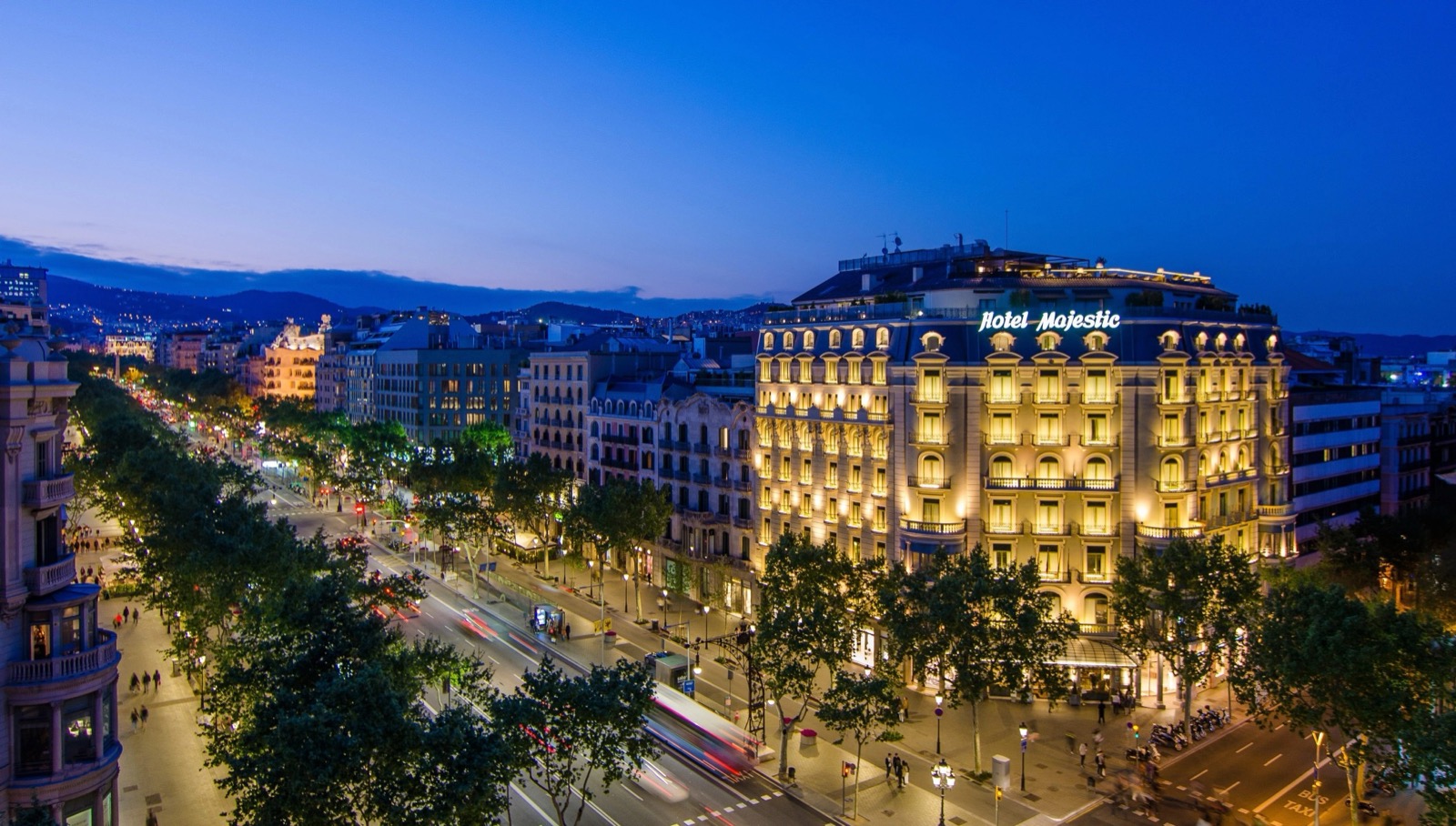 Night exterior of the Hotel Majestic facade on Passeig de Gràcia