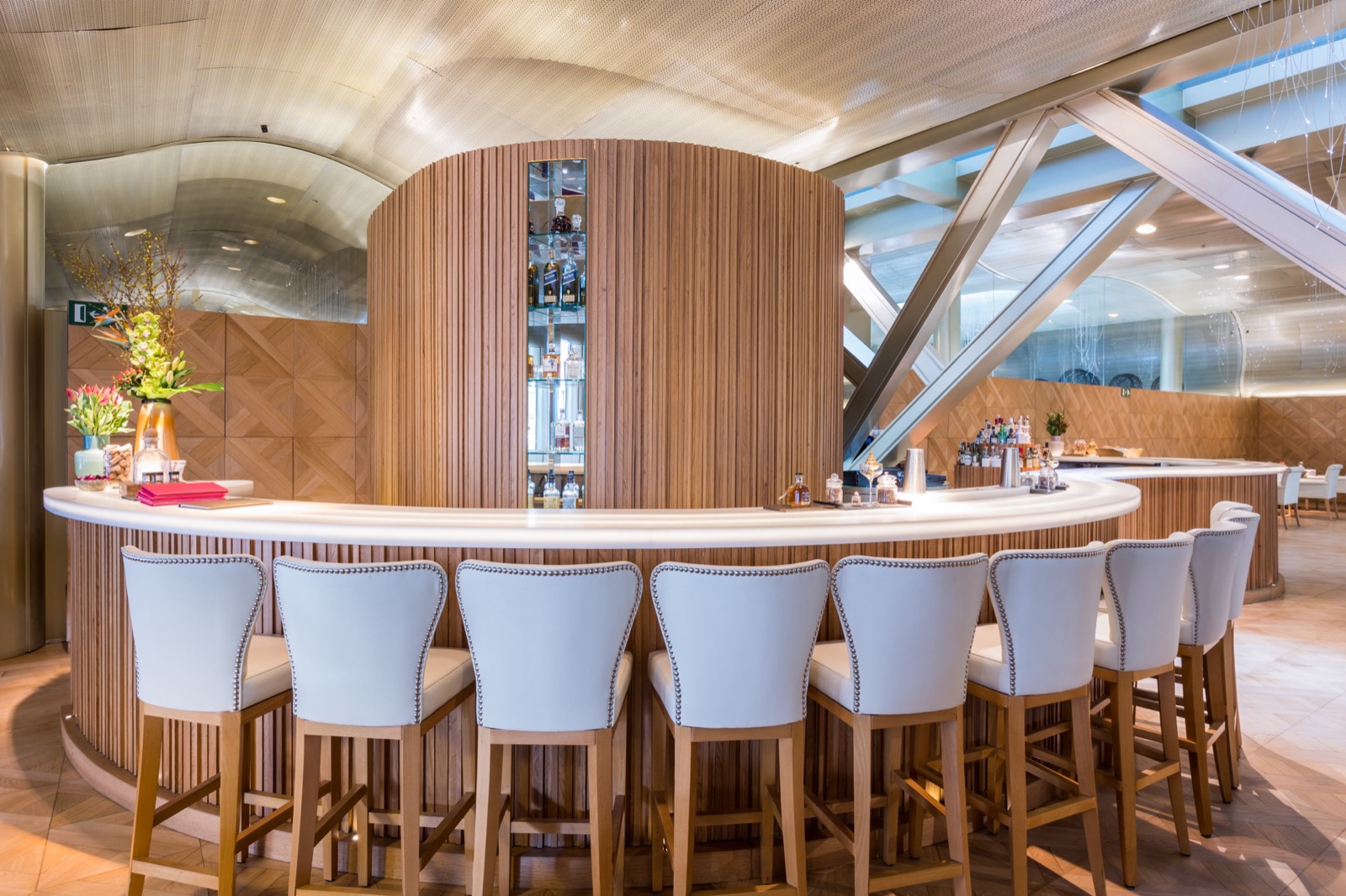 Monument Hotel lobby bar with a wine display and lounge seating