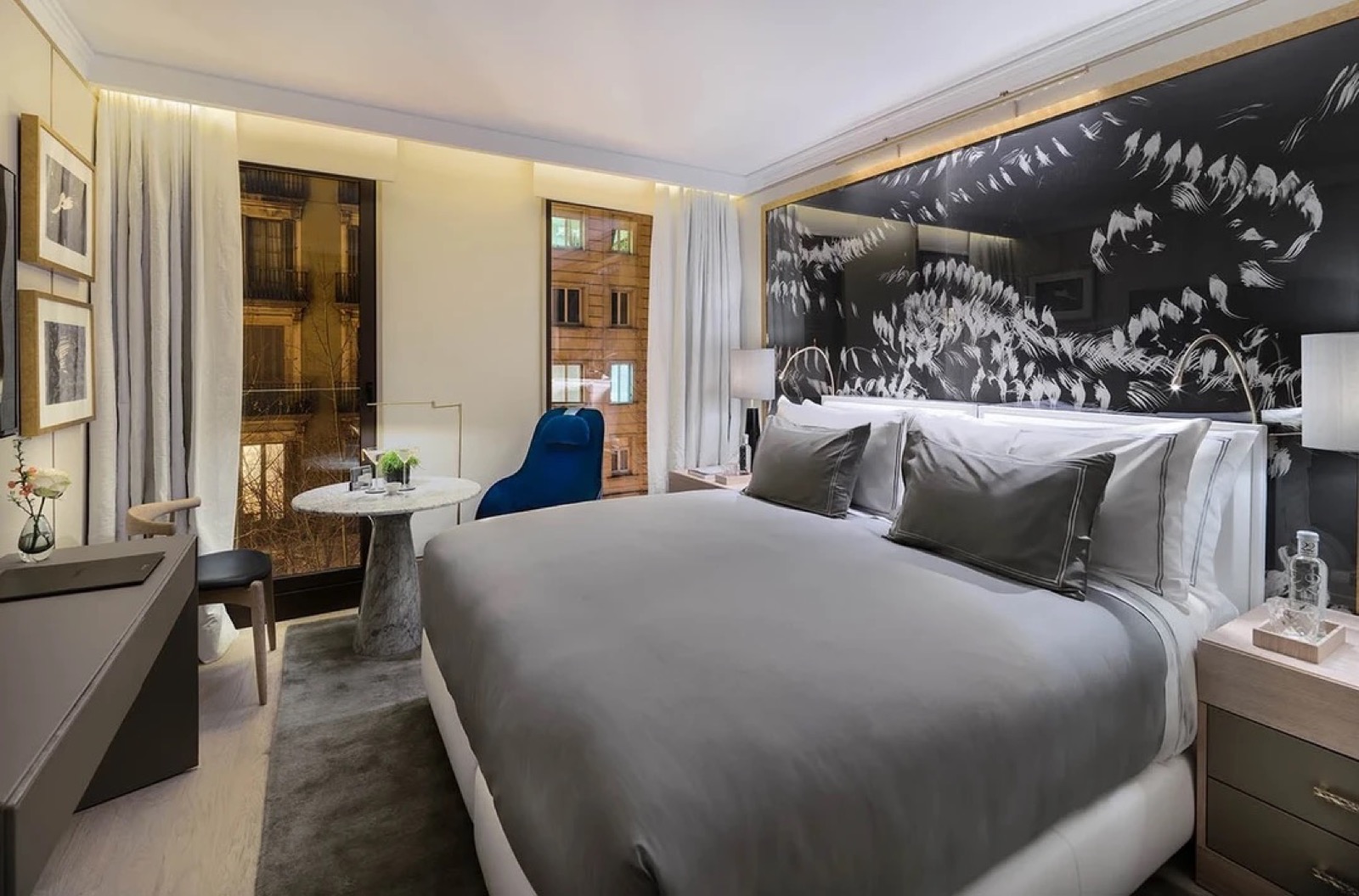 Cosy Barcelona room with a king bed and a view of neighbouring balconies