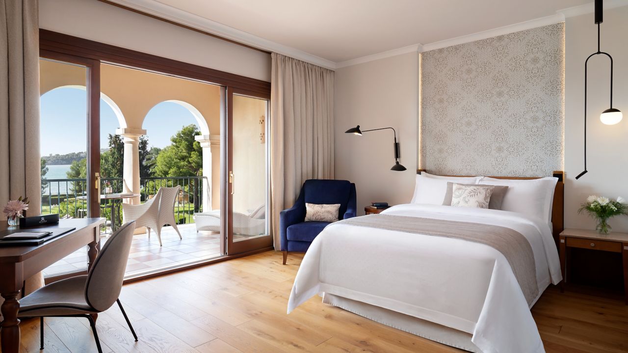 Guest room with sea-view terrace at The St. Regis Mardavall Mallorca Resort