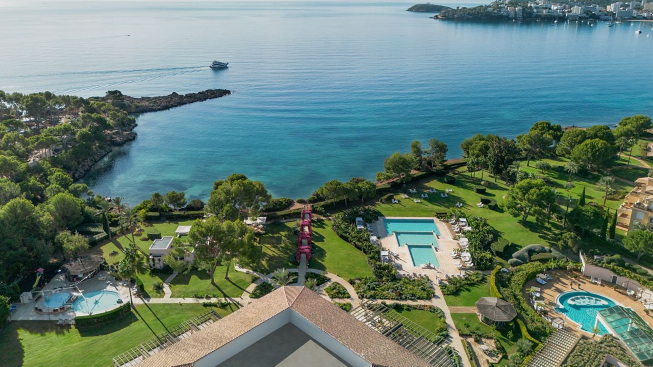 Aerial view of The St. Regis Mardavall Mallorca Resort grounds, pools and coastline