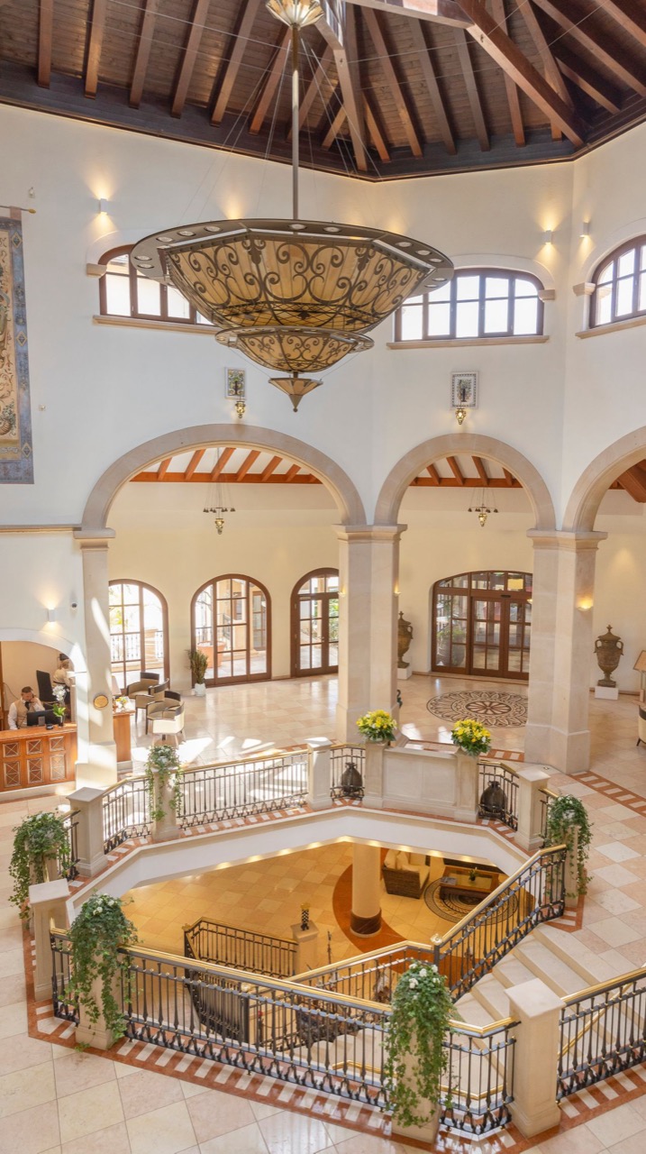 Grand lobby staircase at The St. Regis Mardavall Mallorca Resort