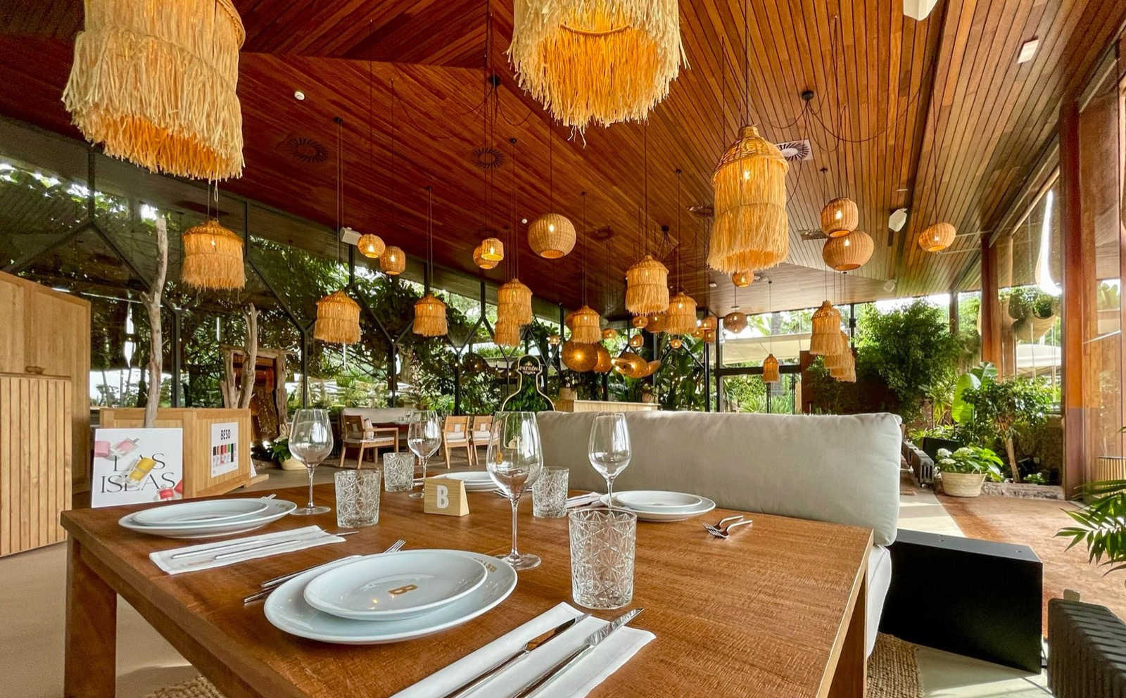 Tropical-style restaurant with rattan pendant lights