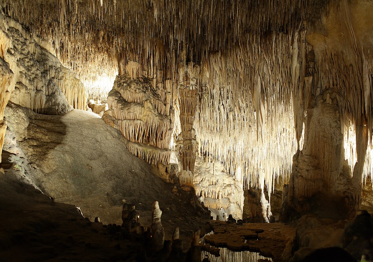 Illuminated stalactites and stalagmites inside the Coves del Drach, Porto Cristo, Mallorca, Spain