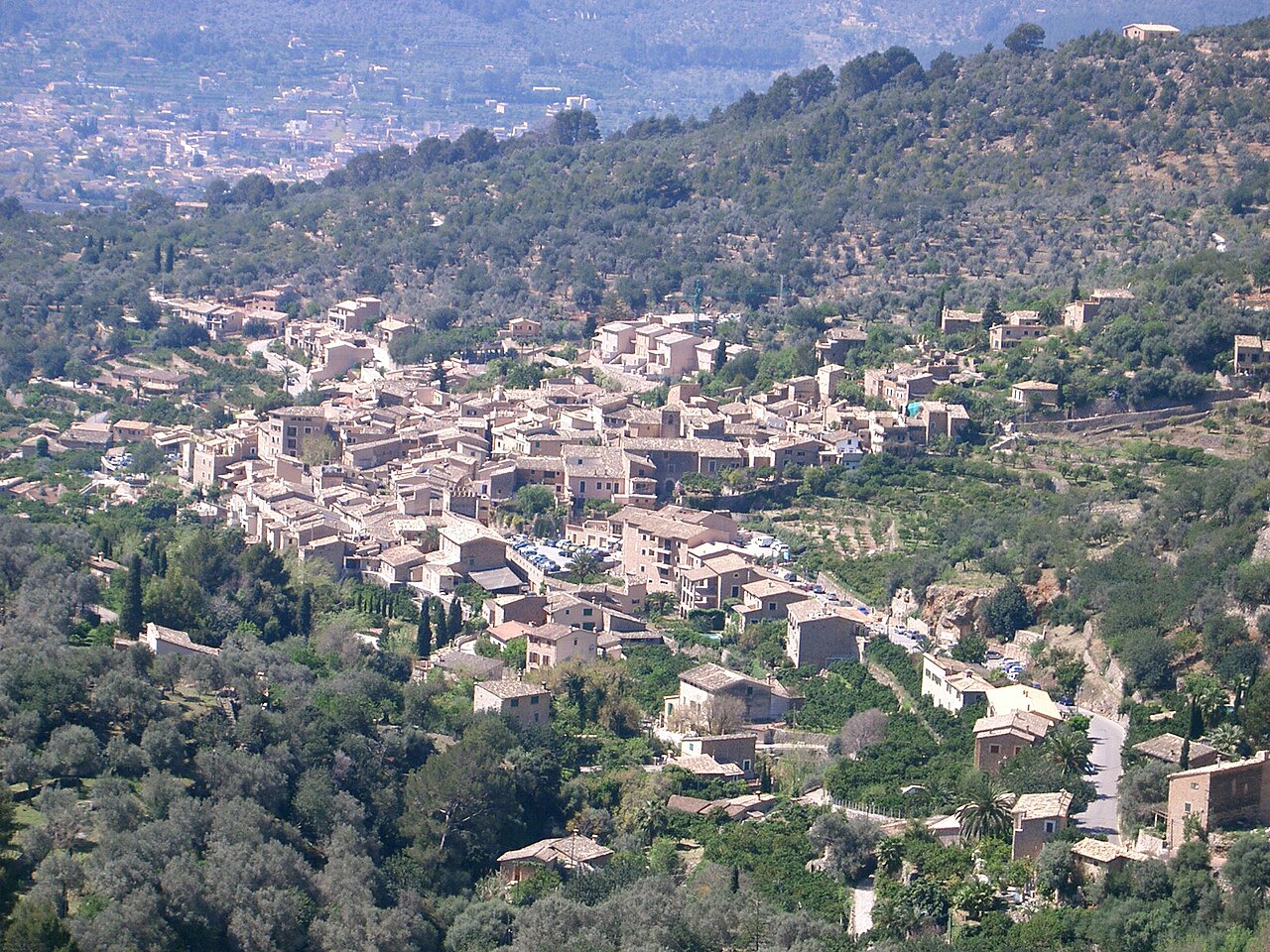 Aerial view of the village of Fornalutx surrounded by terraced orchards, Mallorca, Spain