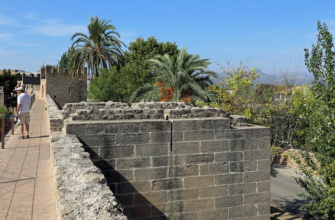 Medieval stone city walls of Alcúdia with walkway along the ramparts, Mallorca, Spain
