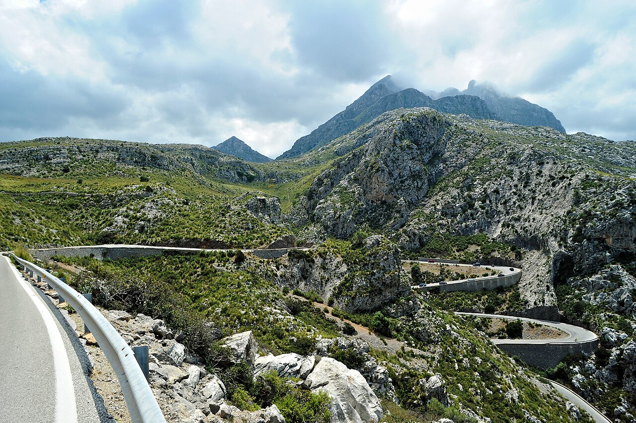 Winding mountain road through the limestone peaks of the Serra de Tramuntana, Mallorca, Spain