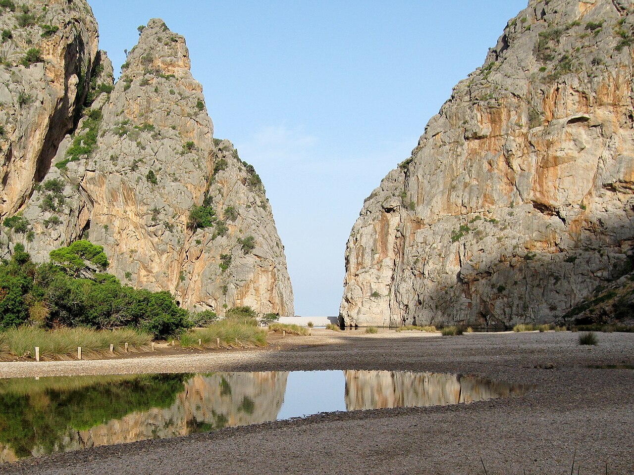 Rocky gorge mouth of the Torrent de Pareis meeting the sea, Escorca, Mallorca, Spain
