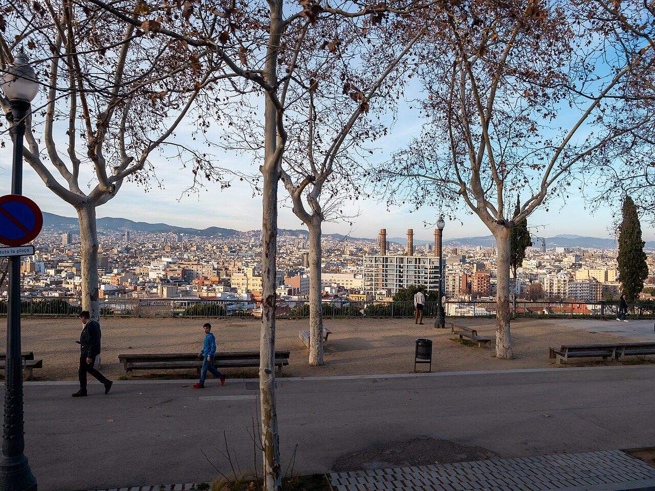 View over Barcelona from a tree-lined viewpoint in Poble-sec (illustrative, not La Xica)