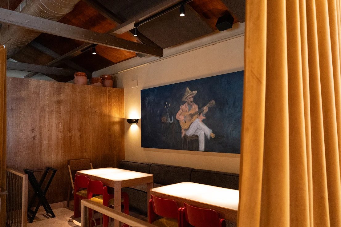 The wood-lined dining room at Finca Nebot