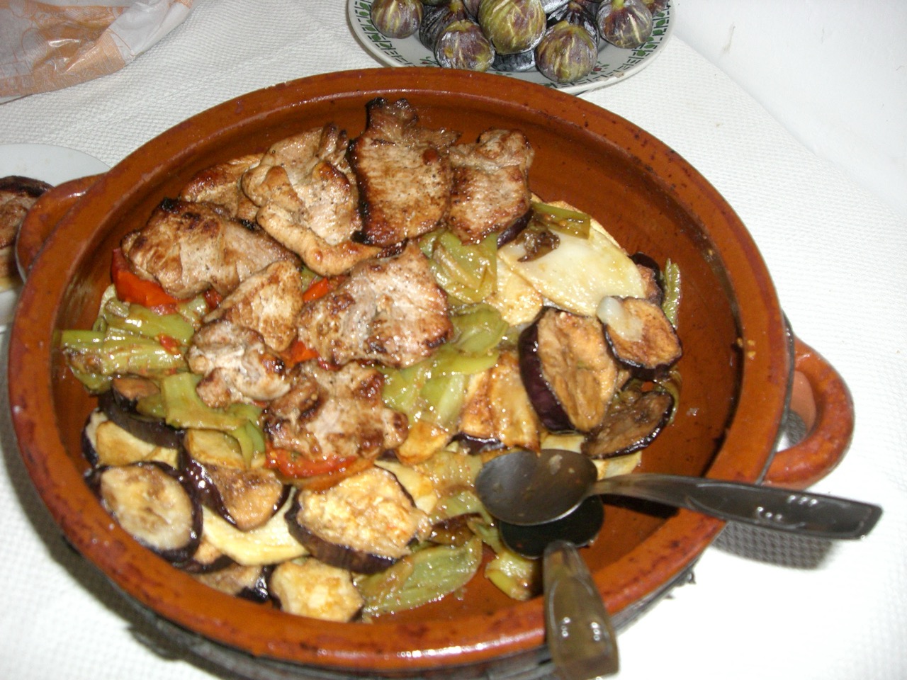 Traditional Mallorcan tombet, a fried vegetable dish, served in a terracotta cazuela