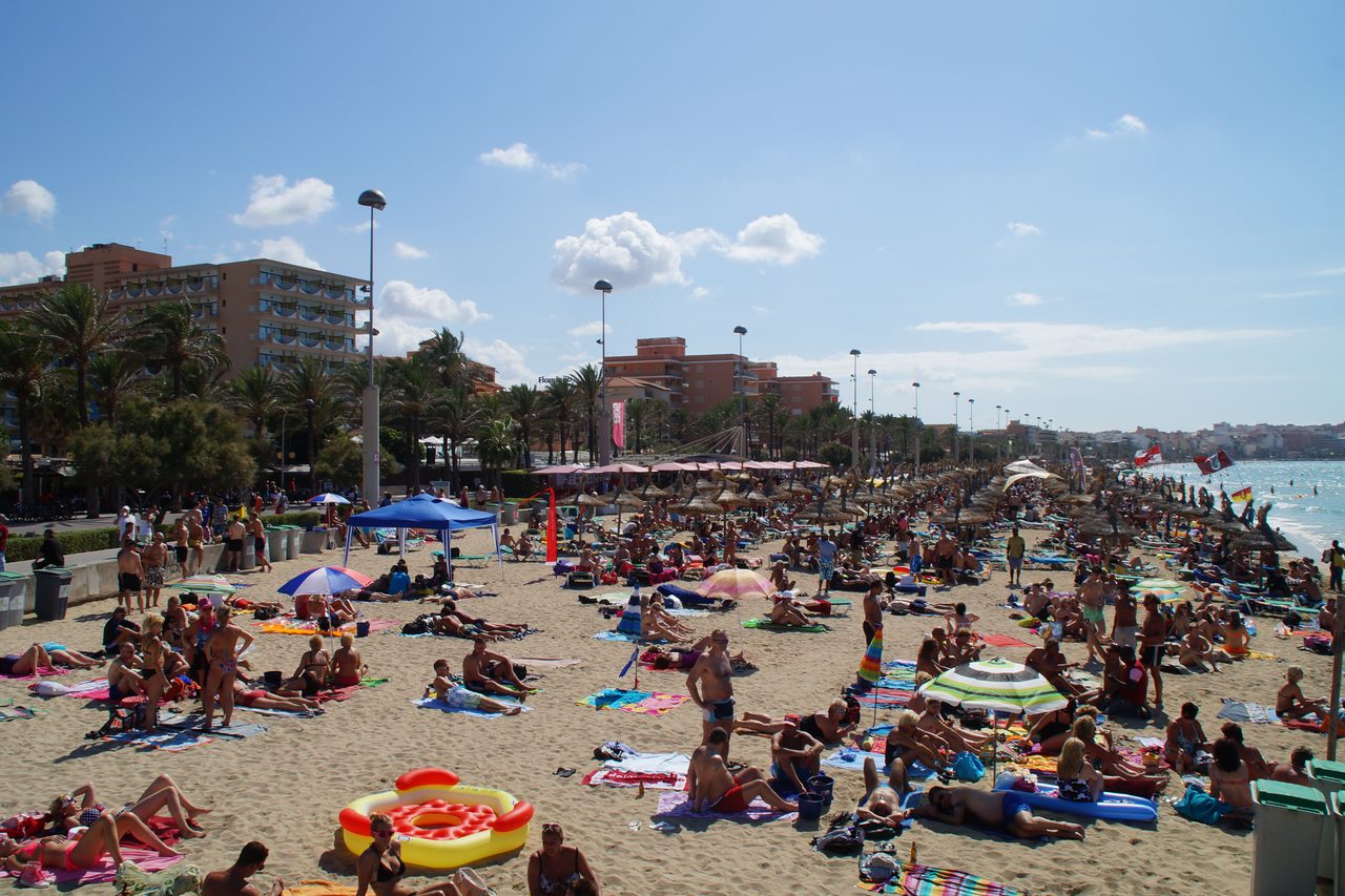 Crowded beach and promenade on the Ballermann stretch of Playa de Palma